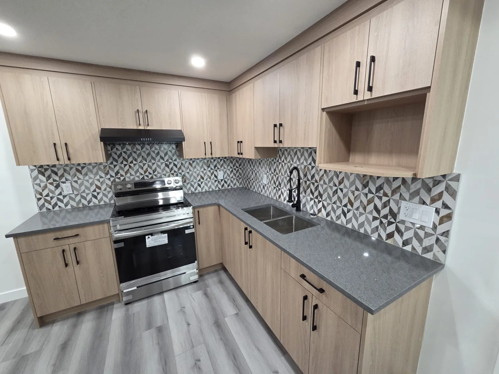 Custom kitchen cabinetry and stainless appliances, Calgary